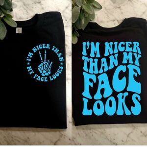 Funny shirt I'm nicer than my face looks humor black and blue retro